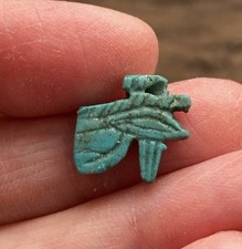 ANCIENT EGYPTIAN. FAIENCE AMULET OF THE ‘EYE OF HORUS’. (CIRCA 600 B.C).