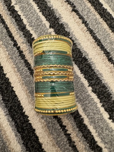 Yellow and green glass bangles - and,