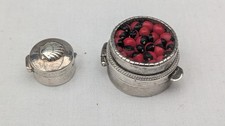 2 Sterling silver pill boxes.