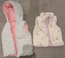 Nutmeg girls gilets x 2 white