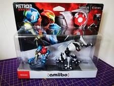 Samus and EMMI Metroid Dread