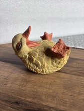 A Cute Laughing Yellow Chick Ornament for A Shelf Decoration