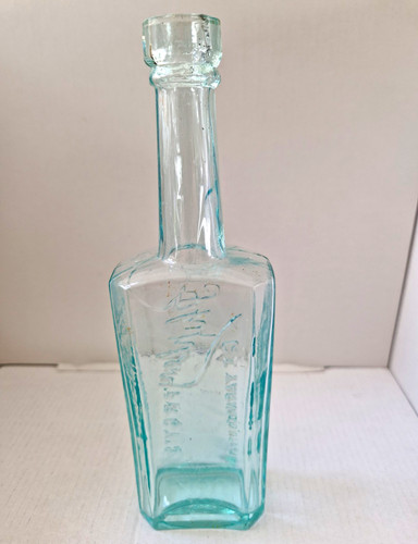 Antique glass embossed - embossed, bottle