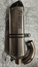 Akrapovic titanium 50mm exhaust can with cosmetic damage
