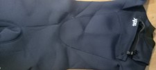 X-Cel Comp front/chest zip wet suit .Youth. 4.3mm.Used once. chest pad