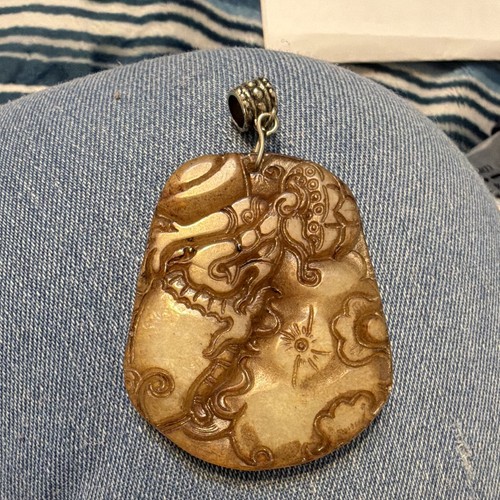 Brown jade dragon pendant