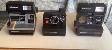 3 Polaroid Cameras 635,1000S,670AF,with cases
