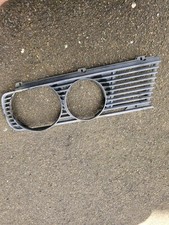 BMW 5/7 series light grille marked Helphos R side