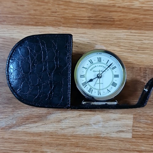 Roger lascelles travel - lascelles, alarm