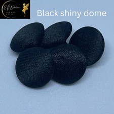 Black satin fabric covered