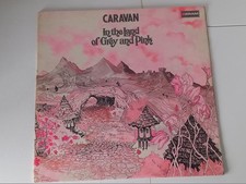 CARAVAN IN THE LAND OF GREY