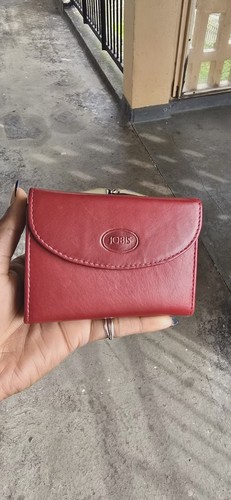 This red leather purse a - leather,
