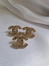 LOT OF 3 GOLD CHANEL BUTTONS