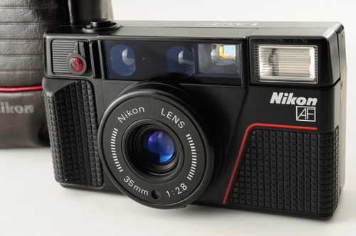 Near mint case nikon - [near, l35