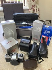Olympus OM10 35mm SLR Camera Bundle, various lenses filters equipment case etc.