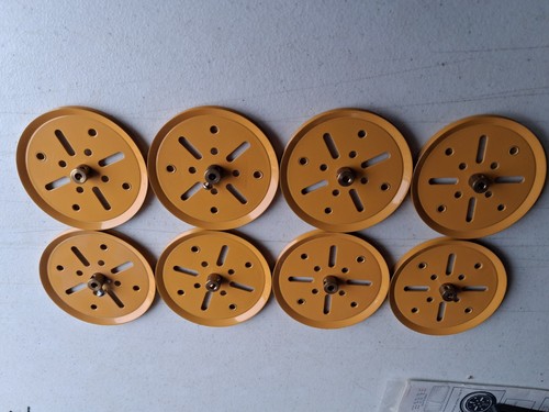 Meccano yellow pulleys - meccano,
