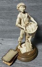 Vintage Capodimonte by Di Garanzia, Boy Selling Fishs, Resin Figurine On Base