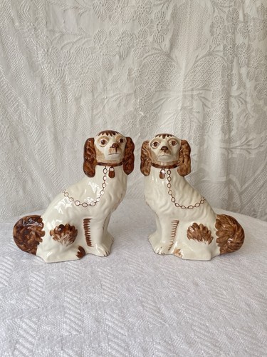Staffordshire dogs pair hand - dogs,