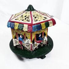 ANTIQUE CAST IRON CAROUSEL