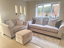 Sofa Set - 4 seater/ 1 snuggled chair / footstool. Comes with decorative pillows