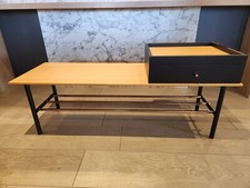 Coffee table with top mounted