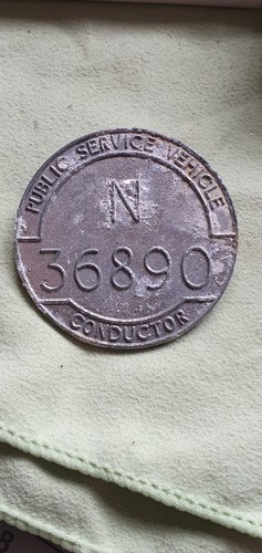 Unusual conductor badge - , n