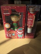 A Sitting Elf For Your Shelf & A Bottle of Magic Christmas Dust.