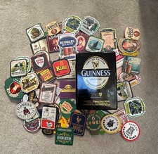 Guinness Tin and 100 Beer Mats