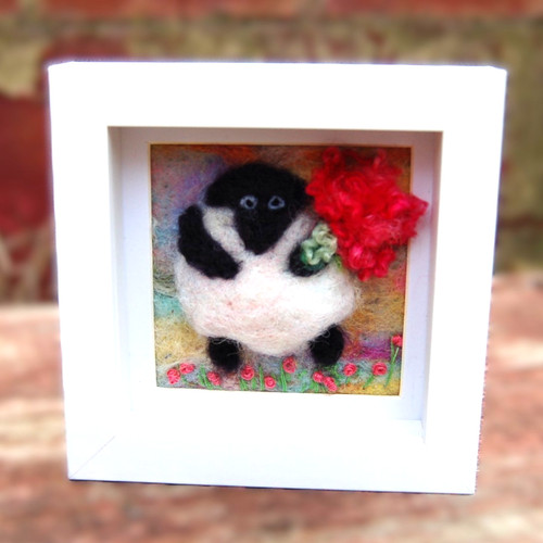Sheep holding flowers
