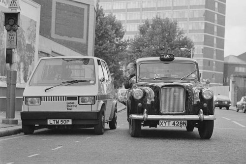 The driver electric taxi - driver,
