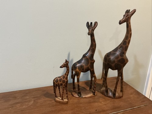 Hand carved wooden - hand, giraffe