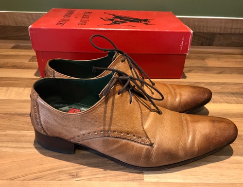 Jeffery west black line tan - "black,