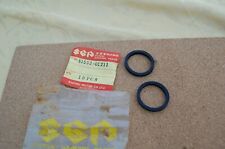 SUZUKI  T125, M12,M15, AC50,A50,K10, K11 HEADLAM,P BRACKET CUSHIONS  NOS