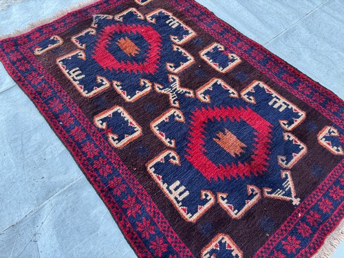 Black hand knotted afghan - hand,