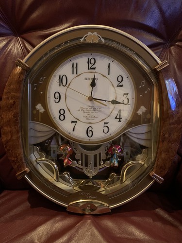 Seiko qxm118brh golden - seiko, puppets