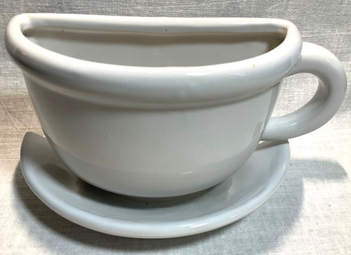 White pottery half tea - half, cup