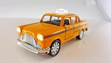 Yellow classic taxi with