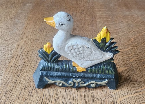 Cast iron door stop - -,