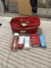clarins gift set including 5 products and make up bag 