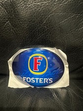 Fosters Oval Fisheye Badge