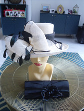 beautiful ladies Capelli Condicci wedding hat and black bag