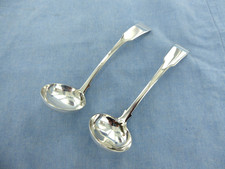 AN ANTIQUE PAIR OF STERLING