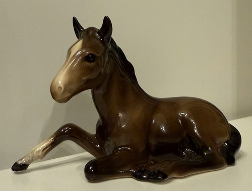 Beswick foal lying - beswick, in