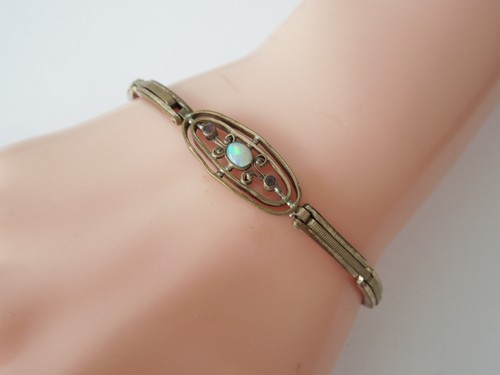 Antique gold colored opal - antique, gold-colored