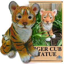 Playful tiger cub sitting - cub,