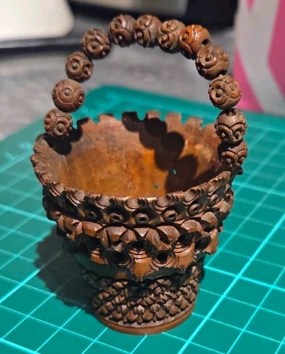 Carved and turned coquila - and,
