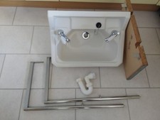 Royal Doulton bathroom washstand sink with taps.