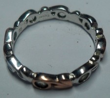 CLOGAU SILVER AND GOLD RING.