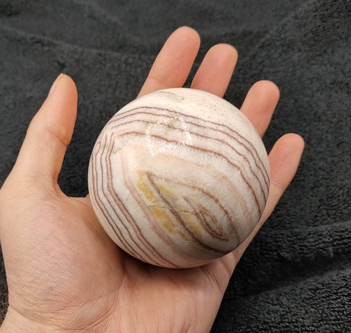 Banded calcite sphere - sphere, white