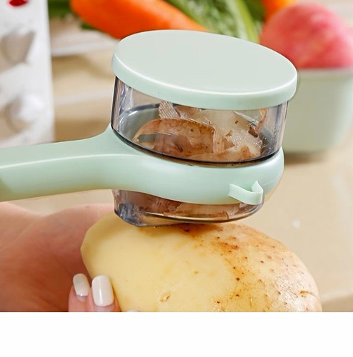 Manual vegetable peeler with - vegetable,